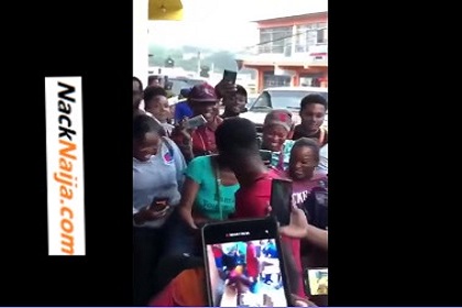 VIDEO: Muffing her on the street while the community watches